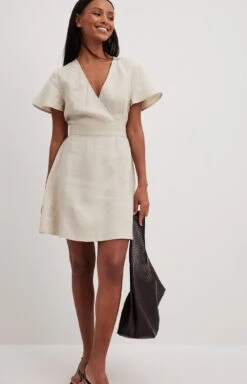 Robe Courte Fluide En Lin Nouée Au Dos -Lady Doux Soldes Magasin linen flowy tie back mini dress 1014 001508 0005 01