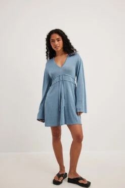 Robe Mini Brillante à Manches Longues 9 Robe Mini Brillante à Manches Longues -Lady Doux Soldes Magasin long sleeve glitter mini dress 1727 000140 0003 15437 01c