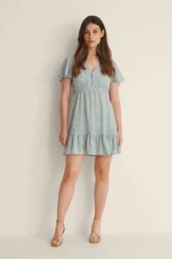 NA-KD Robe Mini Boutonnée À Motifs -Lady Doux Soldes Magasin nakd mini printed buttoned dress 1100 004550 0003 04c 1