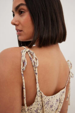 NA-KD Robe Mini Transparente Nouée Sur L’épaule -Lady Doux Soldes Magasin tie shoulder sheer mini dress 1100 004592 920126259